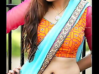Sizzling hot babe in a tight saree teases with her perfect body.