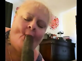 Granny surprises her neighbor with a wild BJ in the trailer, leading to a steamy facial and hilarious reactions.