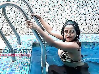Bhabhi's insatiable desire in a steamy swimming pool encounter, leaving her partner breathless and yearning for more.