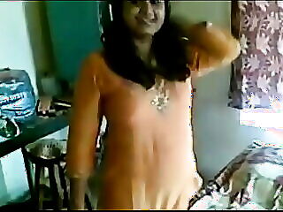 Hot bhabhi flaunts her curves in sexy lingerie, indulging in kinky pleasure.